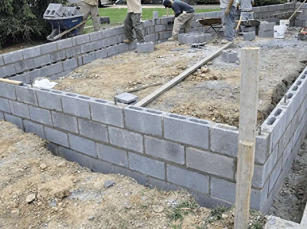 Professionals building a foundation with blocks in Mesa, AZ